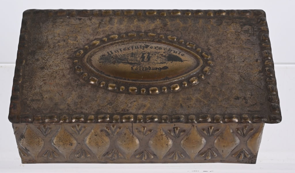 WWII NAZI GERMAN WAFFEN SS NCO CIGARETTE BOX WW2: Attractive WWII Nazi German Waffen SS NCO School Cigarette Box measuring 6 1/2 X 3 3/4 X 2 1/8 coppered tin over wood box with the dedication "UnterF¸hrerschule SS Lauenburg" Excellent.