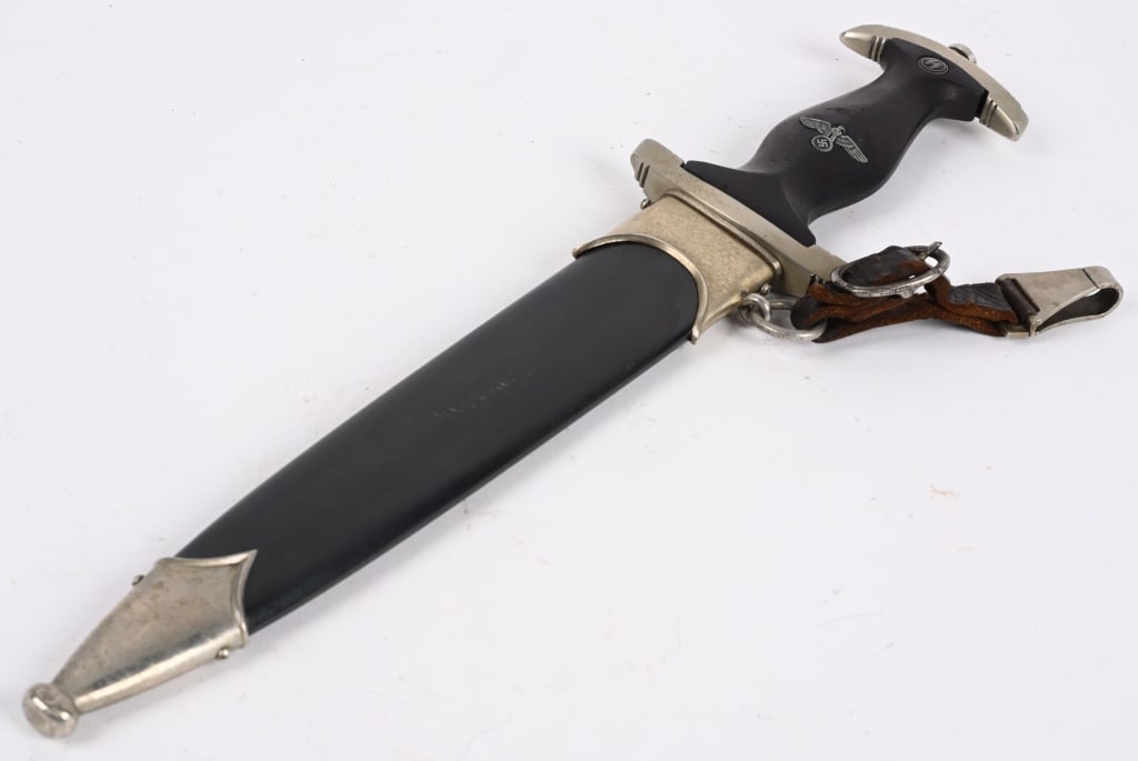 WWII NAZI GERMAN SS M33 DAGGER BY E. PACK & SOHN: Nickel/silver plated blade shows the typical light scabbard runners and minimal light surface spotting and scratches and has been re polished. Well defined acid etched motto, "Meine Ehre Heiﬂt