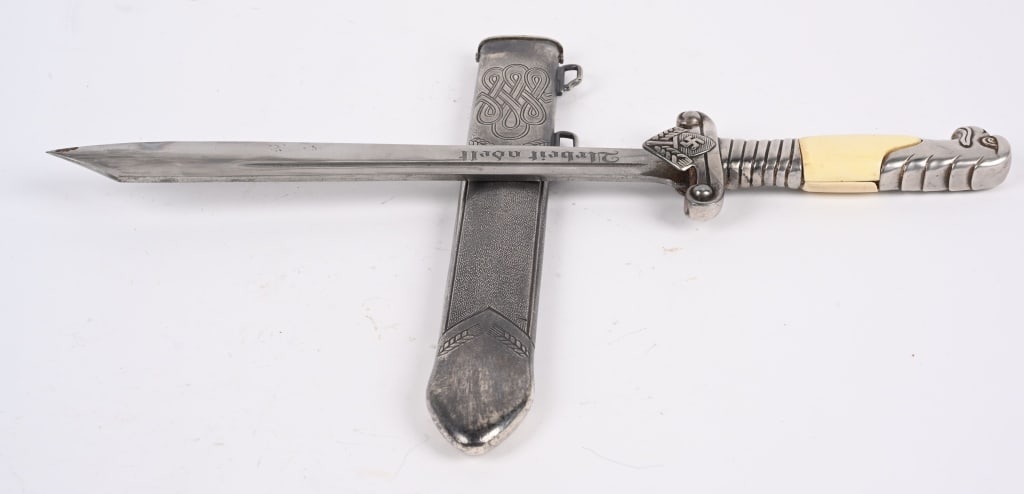 WWII NAZI GERMAN RAD LEADERS DAGGER BY EICKHORN: A Model 1937 Reichsarbeitsdienst F¸hrer Haumesser by Ernst Carl Eickhorn of Solingen. The matte blade on this one is in excellent condition. It also displays wonderful details throughout, with th