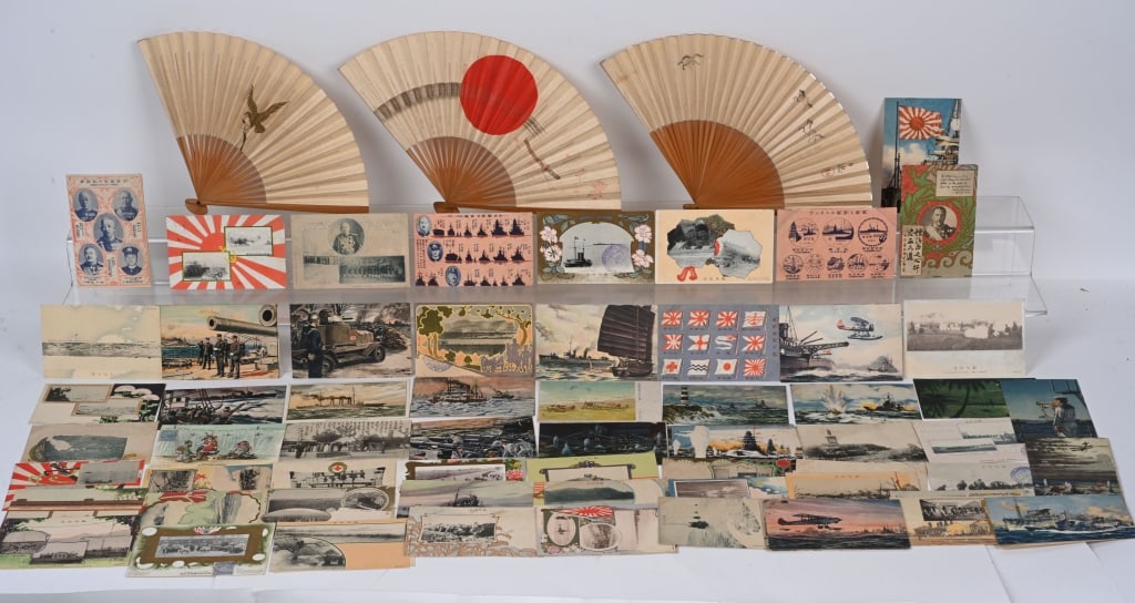 WWII IMPERIAL JAPANESE POSTCARD LOT W FANS WW2: Lot of Japanese ephemera and patriotic hand fans to include 73 photo and color postcards and three patriotic hand fans, all in excellent condition.†