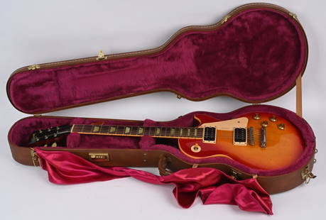 1998 GIBSON LES PAUL CLASSIC 1960 ELECTRIC GUITAR: 1998 Gibson Les Paul Classic 1960 Cherry Sunburst Electric Guitar. Beautiful reissue of one of their most classic guitars. Wonderful all original condition. Serial #8-1750. Comes with hard case.