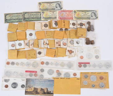 CANADIAN COIN LOT AND CURRENCY: Large lot of Canadian coins mostly cents and nickels. There are some interesting varieties, including double date coins, a reeded edge 1946 penny, Also included are 6 Canadian notes, and several proof