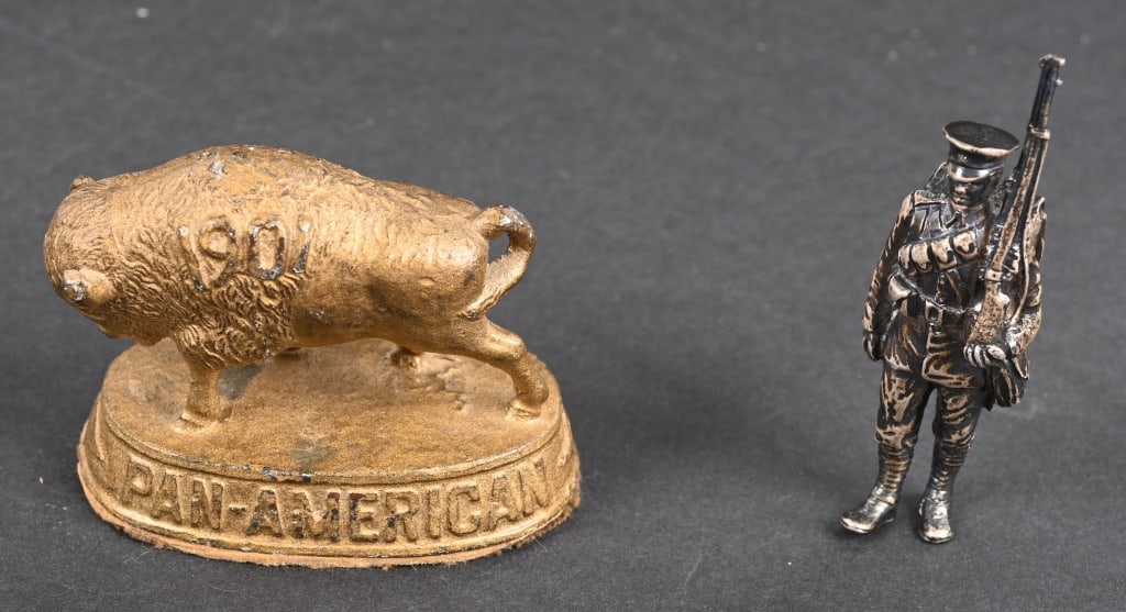 PAN-AMERICAN EXPOSITION BUFFALO PAPERWEIGHT: Great looking Pan-American Exposition Paperweight. Lot also comes with lead Solider figure. 2 1/2" Excellent
