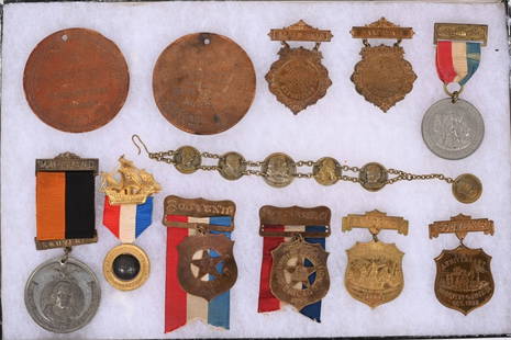 1893 Columbian Exposition 12 BADGES & FOBS: Group of nine (9) badges and three (3) fobs from the 1893 World's Fair.