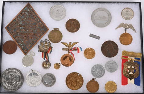 1893 Columbian Exposition 24 TOKENS & BADGES: Group of twenty-four (24) tokens, badges, half dollar coin, and fobs from the 1893 World's Fair.