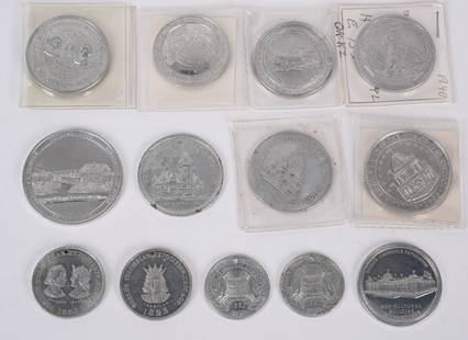 1893 World's Fair 13 ALUMINUM TOKENS: Group of thirteen (13) aluminum tokens from the 1893 Columbian Exposition.