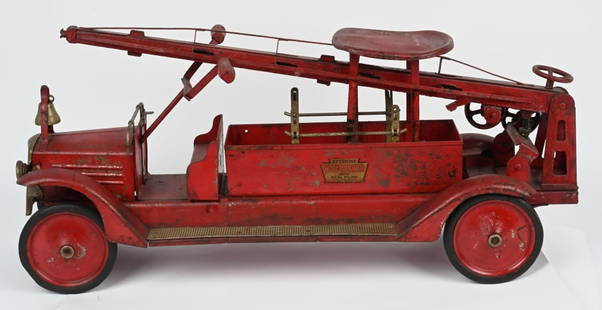 KEYSTONE PRESSED STEEL RIDE-ON WATER TOWER: Original Keystone pressed steel Ride-On Water Tower. All complete with seat and handle. With electric headlights. Has some period over paint. 32" Very Good
