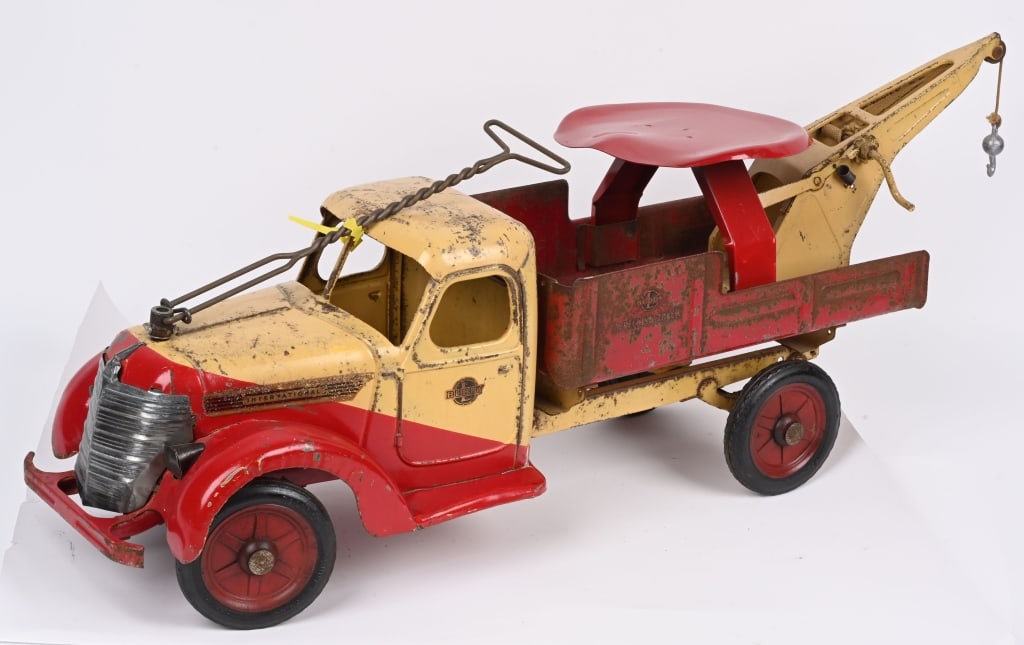 1938 BUDDY L INTERNATIONAL WRECKER: Original 1938 Buddy L International Wrecker. All complete with replacement seat and handle. Truck has decent paint and decals. 33" Very Good