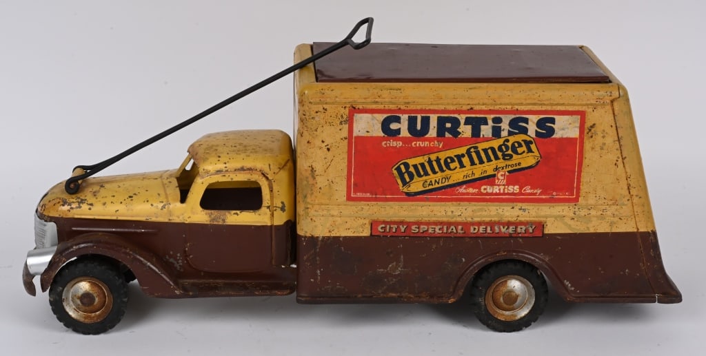 BUDDY L CURTISS CANDY TRUCK: Buddy L Curtiss Candy Truck. Has decent original paint and decals. Still has steering handle. Front grill repainted and replaced roof. A desirable Buddy L Truck. 24" Very Good
