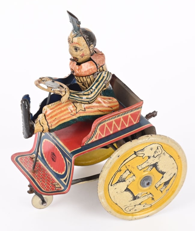 G&K TIN WINDUP CLOWN ON ECCENTRIC CAR (1 of 5)