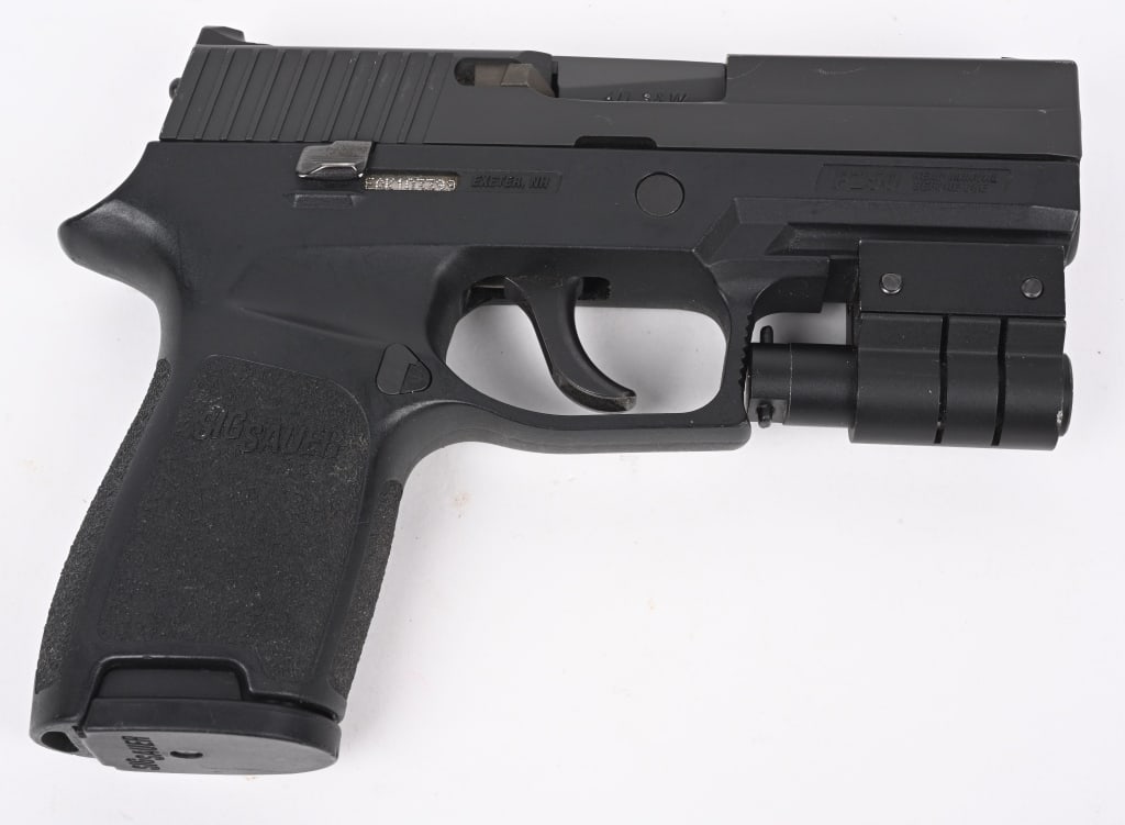 SIG SAUER P250 SEMI AUTO PISTOL: SERIAL EAK103399. BARREL 3 3/4". CALIBER 40. MAGAZINE 10-RD. Polymer frame, matte finish, double action, installed laser, white dot combat sights . Condition., Near new with light handling. MODERN DB