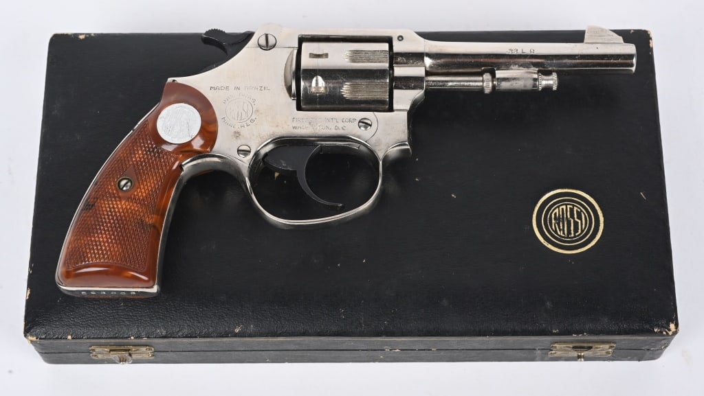 EARLY CASED ROSSI NICKEL .22 REVOLVER: SERIAL 593003. BARREL 3". CALIBER 22L. Early Spanish copy of the S& W Ladysmith small frame 22 revolvers. 7-shot, double action, factory nickel, brown plastic grips and comes with original hard jewelr