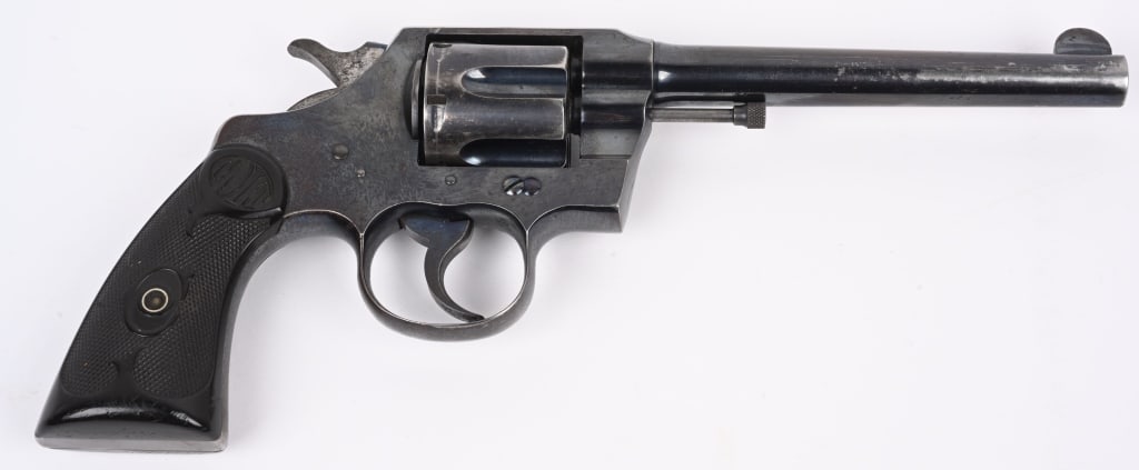 PRE WAR COLT ARMY SPECIAL .41 REVOLVER: SERIAL302587. BARREL 6". CALIBER .41 COLT MADE IN 1908 FIRST YEAR PRODUCTION. Famous early high polish blue finish with fire blue smalls, Colt gutta percha grips. There is a presentation to M. KR ??? 
