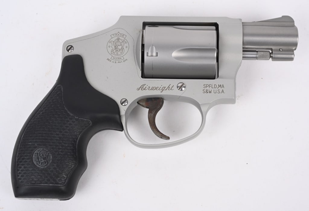SMITH & WESSON MODEL 642-2 AIRWEIGHT DA REVOLVER: SERIAL NUMBER: CTL3123. BARREL: 1-7/8". CALIBER: .38 SPECIAL + P. MANUFACTURED: 2010S. Factory markings and features, including a 5 shot fluted cylinder. Matte stainless slide and case colored trigger