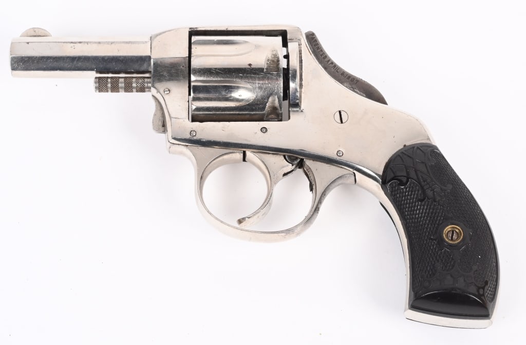 FINE H&R DOUBLE ACTION POCKET REVOLVER: SERIAL NSN. BARREL 2.5". CALIBER .32 Safety hammer model, 1887 pat. , gutta percha grips, nickel finish, no hammer spur (correct), 6-shot, double action. H&R name not stamped on gun. Octagon barrel. R