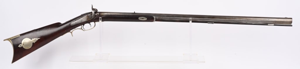 LT. WT HALF STOCK PERCUSSION SPORTING RIFLE: 32" Octagon barrel is maker stamped J. RU?. Back lock action, walnut half stock, double set trigger, nickel plated brass furniture including oval patch box. Caliber is .36. Condition. Iron hardware is