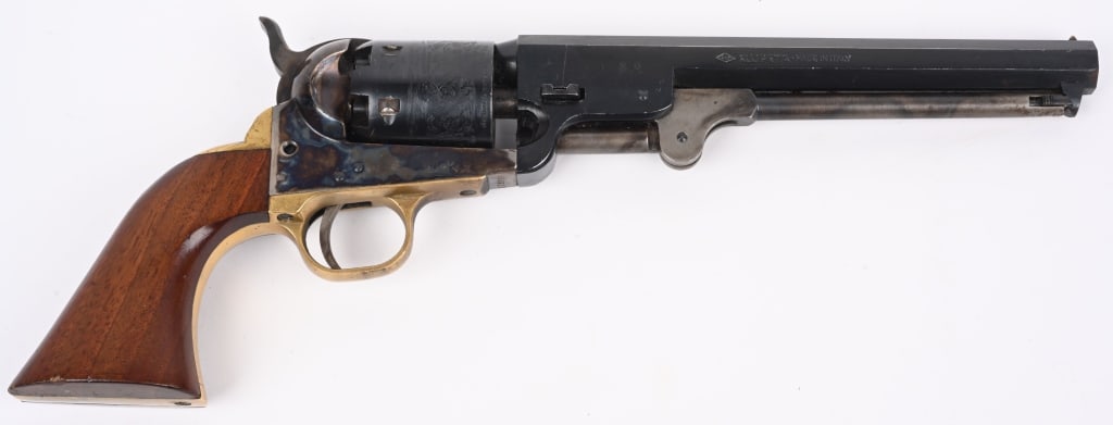 PIETTA COPY COLT MODEL 1851 NAVY REVOLVER: SERIAL 503627. BARREL 7.5". CALIBER 36. Features blue octagon barrel and naval scene rolled cylinder, case color frame, brass strap, one piece walnut grips. Condition. Has some marks near barrel wedge