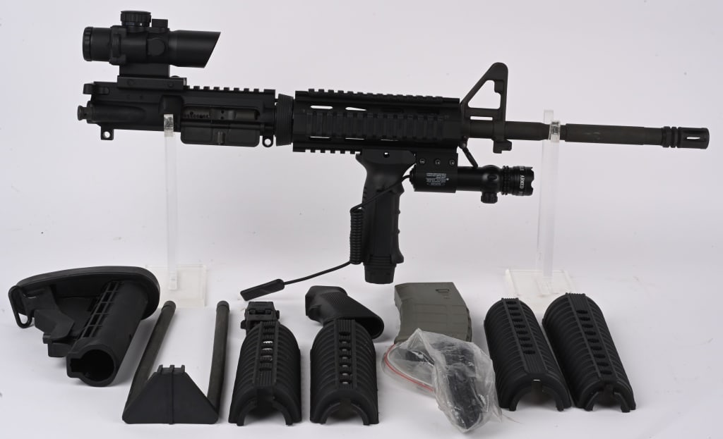 COLT AR-15/M4 UPPER WITH EXTRA PARTS: Colt AR-15 upper receiver with a 16" M4 profile barrel being marked "C MP/5.56 NATO 1/7". Flat top upper with a Sun Optics red dot sight. Aluminum Picatinny rail. Bolt is "C" marked. Charging handle l