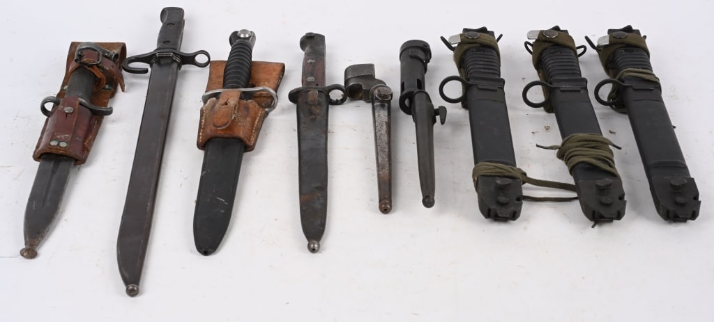 LOT OF MOSTLY EUROPEAN BAYONETS: Includes: 3X West German KCB-77 M1 M16 bayonets. Sig M1957 Bayonet with scabbard and leather frog. Swedish M1896 Mauser Bayonet with scabbard and leather frog. Yugoslavian M24-47/M48 Mauser bayonet wi