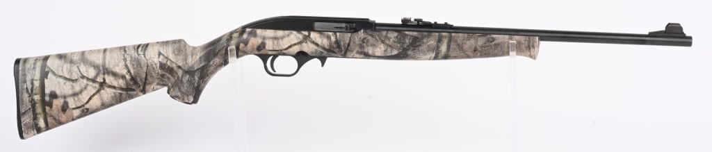 MOSSBERG MODEL 702 PLINKSTER .22 SEMI AUTO: SERIAL EMD3713143. BARREL 18". CALIBER 22LR. Camo nylon stock, blue finish, folding rear sight, hooded front sight. No magazine. CONDITION. Near new with light handling. MODERN DB