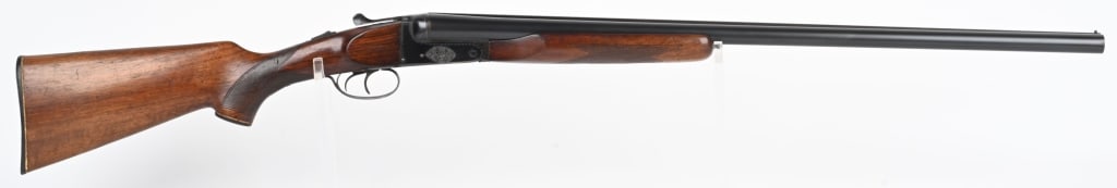 ZABALO 12 GA. SXS SHOTGUN: SERIAL 157520. BARRELS 28". GAUGE 12. CHAMBERS 3". CHOKES FULL/FULL. LOP 14.5". Features double triggers, solid rib, blue finish, engraved box lock, pistol grip checkered walnut stocks with grip cap &