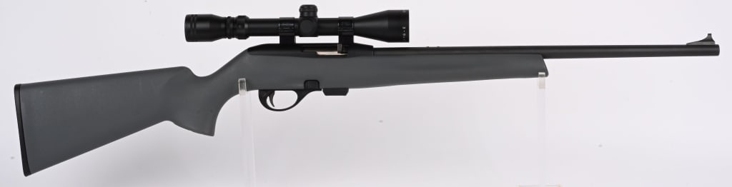 REMINGTON MODEL 597 SEMI AUTO 22 RIFLE: SERIAL A2708543. BARREL 20". CALIBER 22LR. Magazine fed (included) , gray nylon stock, matte finish, rear sight removed and sports a Simmons 3-9x40 scope. Condition. Light handling only. MODERN DB
