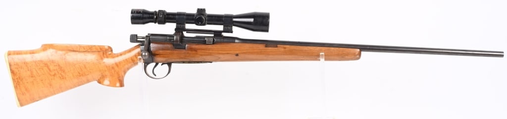 SPORTERIZED BRITISH ENFIELD RIFLE: SERIAL 95695. BARREL 25". CALIBER .303. No 1, MK III. Custom pistol grip maple stock, custom brass floor plate cover with initials, blue finish, numerous British proofs, Tasco scope. re purposed foren