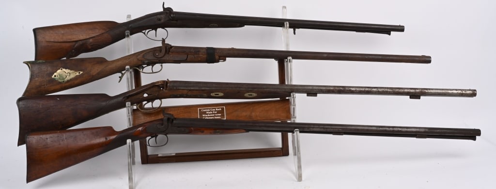 LOT (4) ANTIQUE MUZZLE LOADING SXS SHOTGUNS: A. UNMARKED. TWIST STEEL. 12 BORE. Nice checkered hardwood stock. Metal brown. One hammer spur broken. Needs a little work but could be a decent gun. B. Nice half stock that has a carved Boars head at
