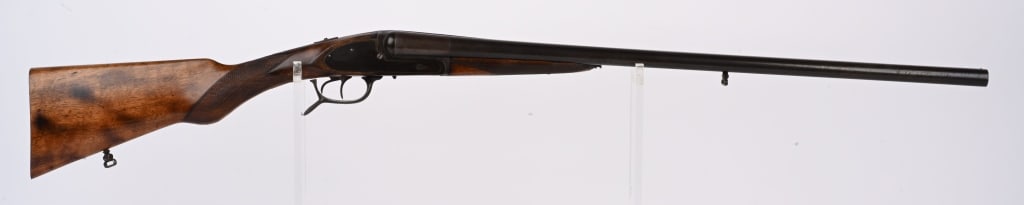 MODELE BREVETTE S.G.D.G. SXS SHOTGUN: SERIAL 13686. BARRELS 27". GAUGE 16 CHAMBERS 2 3/4. CHOKES SKEET/SKEET. LOP 14". Under lever release, missing butt plate, blue finish, side lock actions. swivels. Condition. Beautiful wood, sharp chec