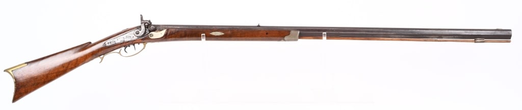 RIDDLE HALF STOCK PERCUSSION PLAINS RIFLE: BARREL 39". CALIBER 38. Full octagon barrel, working double set triggers , walnut stock, iron hardware, brass furniture , pewter tip, three silver appliques, metal wrist repair over cracks. Most likel