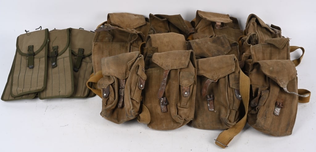 LOT OF VARIOUS RUSSIAN/AMERICAN MILITARIA: 17 Russian/Combloc 4-cell shoulder pouches. 3 1905 Pattern Leather slings. Combloc 4 cell mag pouch, with 4 blued steel magazines, all European production. Also includes 10 canvas cleaning rod cases, 