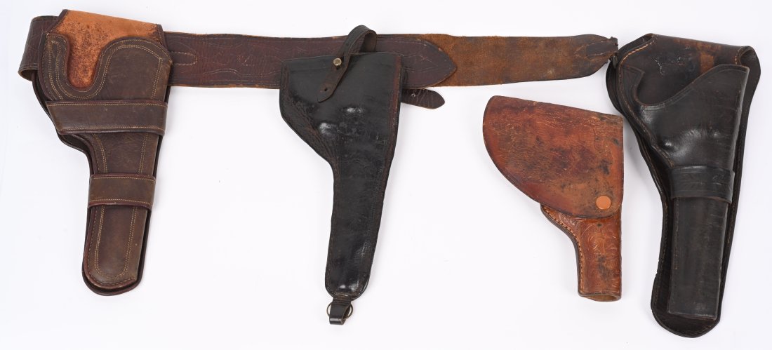 LOT (4) ANTIQUE HOLSTER: One early tooled flap holster fits a 1922 Browwning semi auto but would fit similar guns like the Savage. The other three holsters are for the Colt New Army Navy swing out 1889 series of revolvers. On
