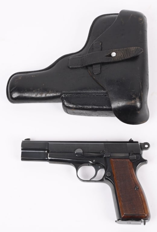 BELGIAN FN P-35 HIGH POWER 9MM POLICE RIG: SERIAL NUMBER 72616 BARREL 4 3/4" CALIBER 9MM PARA, MANUFACTURED IMMEDIATE POST WW2. Produced by Fabrique National in Herstal with bright commercial finish and checkered walnut grips. Serial numbered 