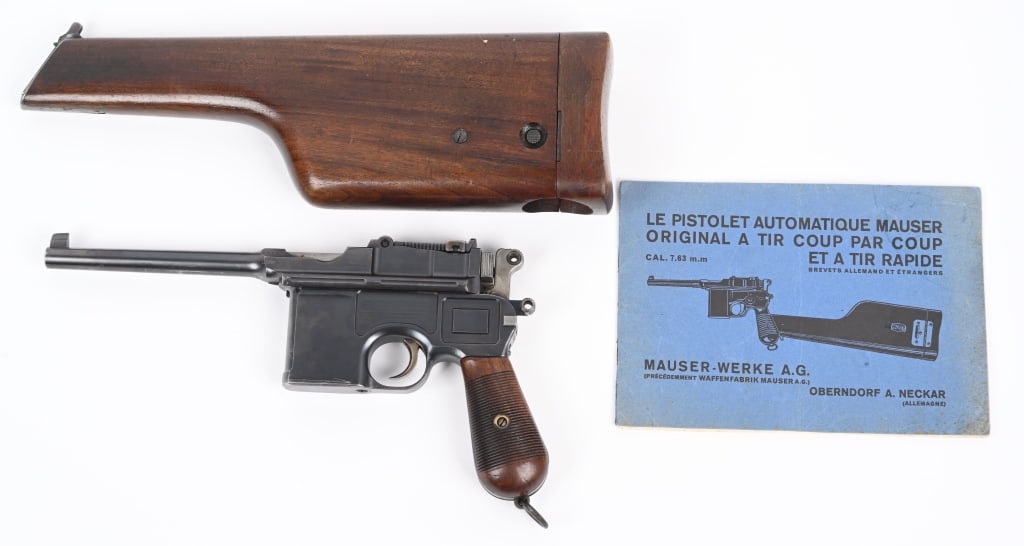 MAUSER C96 7.63 BROOMHANDLE PISTOL W/ STOCK: SERIAL NUMBER 97867 BARREL 5 1/2" CALIBER 7.63 MAUSER MANUFACTURED 1905. Blue finish with grooved 2 piece varnished walnut grips. Straw finished trigger with peacock blue finished bolt guide, sight el