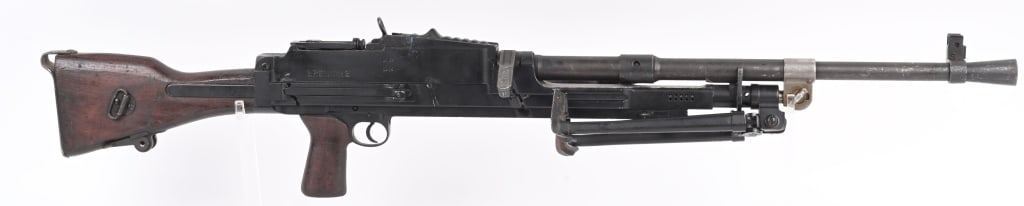 1945 DATED BRITISH BREN MK 2 DUMMY GUN: Original non matching kit, turned into a display piece. Receiver has torch cut in three sections. Barrel is intact, and is removable. Bipod still folds out as well. Charging handle is not movable. Bla