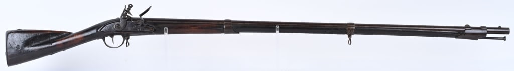 FINE US SURCHARGED REV, WAR CHARLEVILLE MUSKET: SERIAL NUMBER N/A BARREL 44" CALIBER .69 SMOOTHBORE MANUFACTURED CIRCA 1768. Wonderful French Charleville model 1768 Musket with US surcharge markings. A recently discovered US Revolutionary War Model