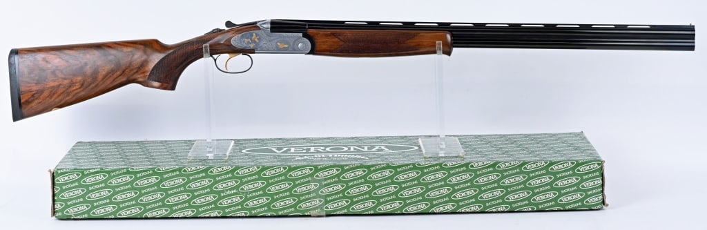 ENGRAVED ITALIAN VERONA LX692 O/U SHOTGUN WITH BOX: SERIAL NUMBER: 138555. BARREL: 28". CALIBER: 20 GAUGE. MANUFACTURED: 2000. Made in Italy and imported by ECC of Boulder City Nevada. Vent rib barrel, with brass bead front sight. Barrels are blued and