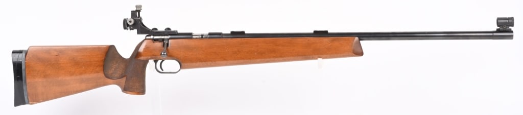 SAVAGE ANSCHUTZ TARGET .22 RIFLE: SERIAL 10735654. BARREL 26". CALIBER .22LR. Features blue finish, globe front sight, two barrel scope blocks, Olympic style peep sight, target wood stock, adjustable butt plate. Top quality rifle made