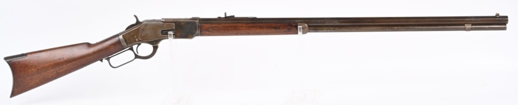 DOCUMENTED WINCHESTER MODEL 1873 1ST MODEL RIFLE: SERIAL NUMBER 29151 BARREL 30" CALIBER 44-40 (44WCF) MANUFACTURED 1878. Desired 1st model Winchester 1873 with thumbprint dust cover and 30 inch octagon barrel. Documented with Winchester Factory reco