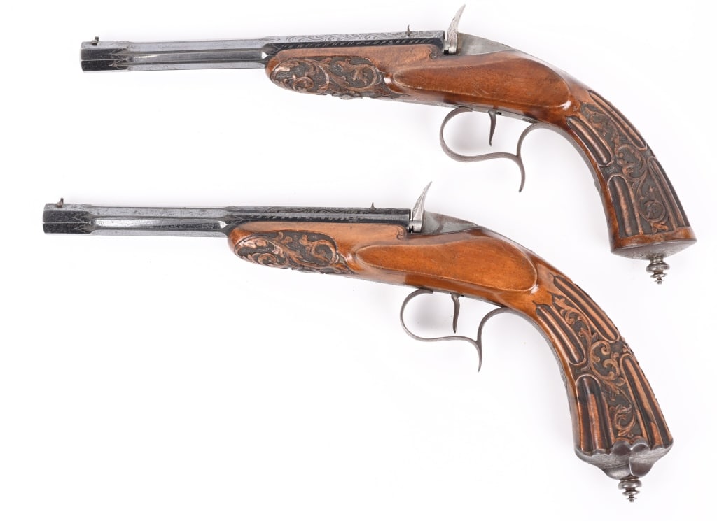PAIR OF JOSEPH VIVARIO FLOBERT TARGET PISTOLS: SERIAL NUMBER N/A BARREL 8" CALIBER .22 FLOBERT MANUFACTURED CIRCA 1880. Superb pair of Belgian Flobert Parlor target pistol by Joseph Vivario of Liege Belgium. Fluted octagon barrels with top flat ma