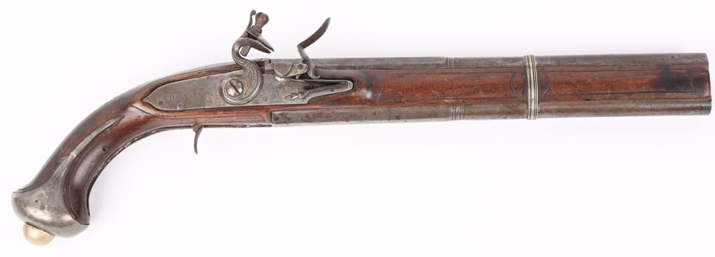 MIDDLE EASTERN OVER UNDER FLINTLOCK PISTOL: SERIAL NUMBER N/A BARREL 11" CALIBER 55 SMOOTHBORE MANUFACTURED CIRCA 1850'S. Flintlock over under pistol with sliding pan dual ignition. Octagon to round smooth bore barrels with one piece walnut sto