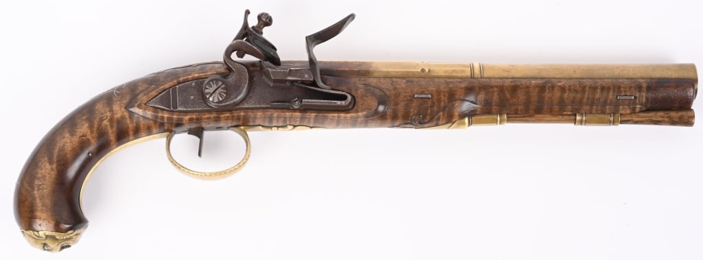 DAVID HUGHES CONTEMPORARY FLINTLOCK PISTOL: SERIAL NUMBER N/A BARREL 10" CALIBER .50SMOOTHBORE MANUFACTURED CIRCA 2000. Handcrafted by David Hughes of Gibsonia Pa, with part round / octagon brass smoothbore barrel. L&R brown finished flint lock
