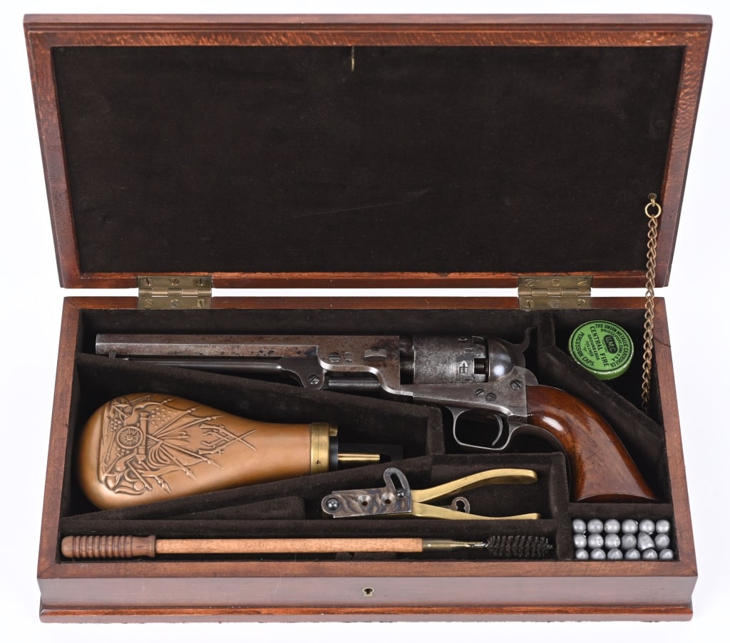 CASED COLT'S LONDON NAVY REVOLVER WITH ACCESORIES: SERIAL NUMBER 39578 BARREL 7 1/2" CALIBER .36 PERCUSSION MANUFACTURED 1854. With Samuel Colt's desire to increase his market share he increased his production to include a manufacturing facility in Lo