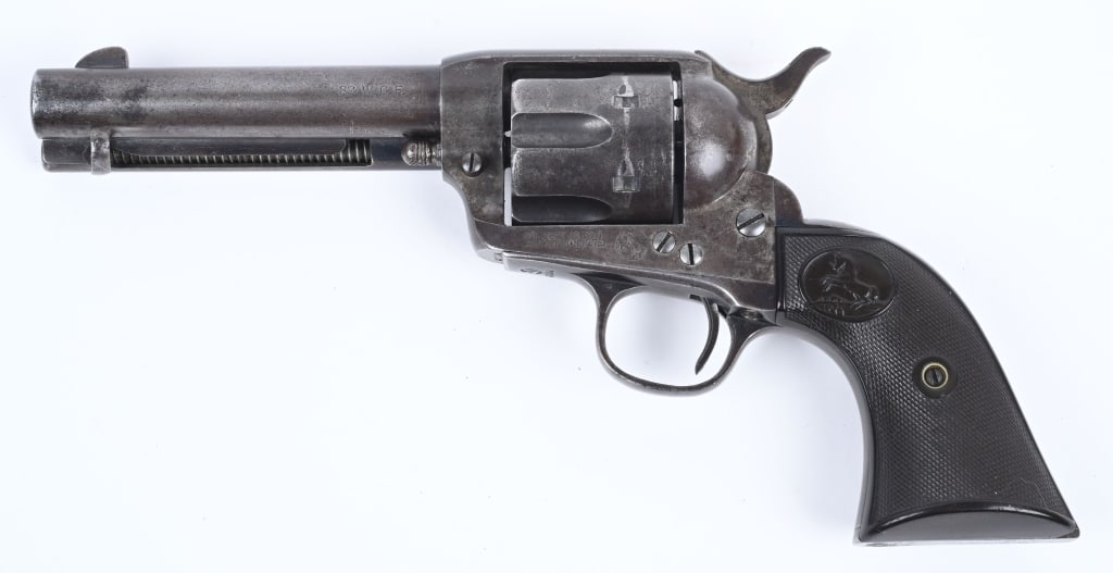 COLT SAA ARMY 1ST GEN. REVOLVER: SERIAL 237528. BARREL 4 3/4". CALIBER 32WCF. MADE IN 1902. Two line barrel address, two line patents on frame, matching numbers including right grip panel. Gutta percha grips. Condition Butter smooth 