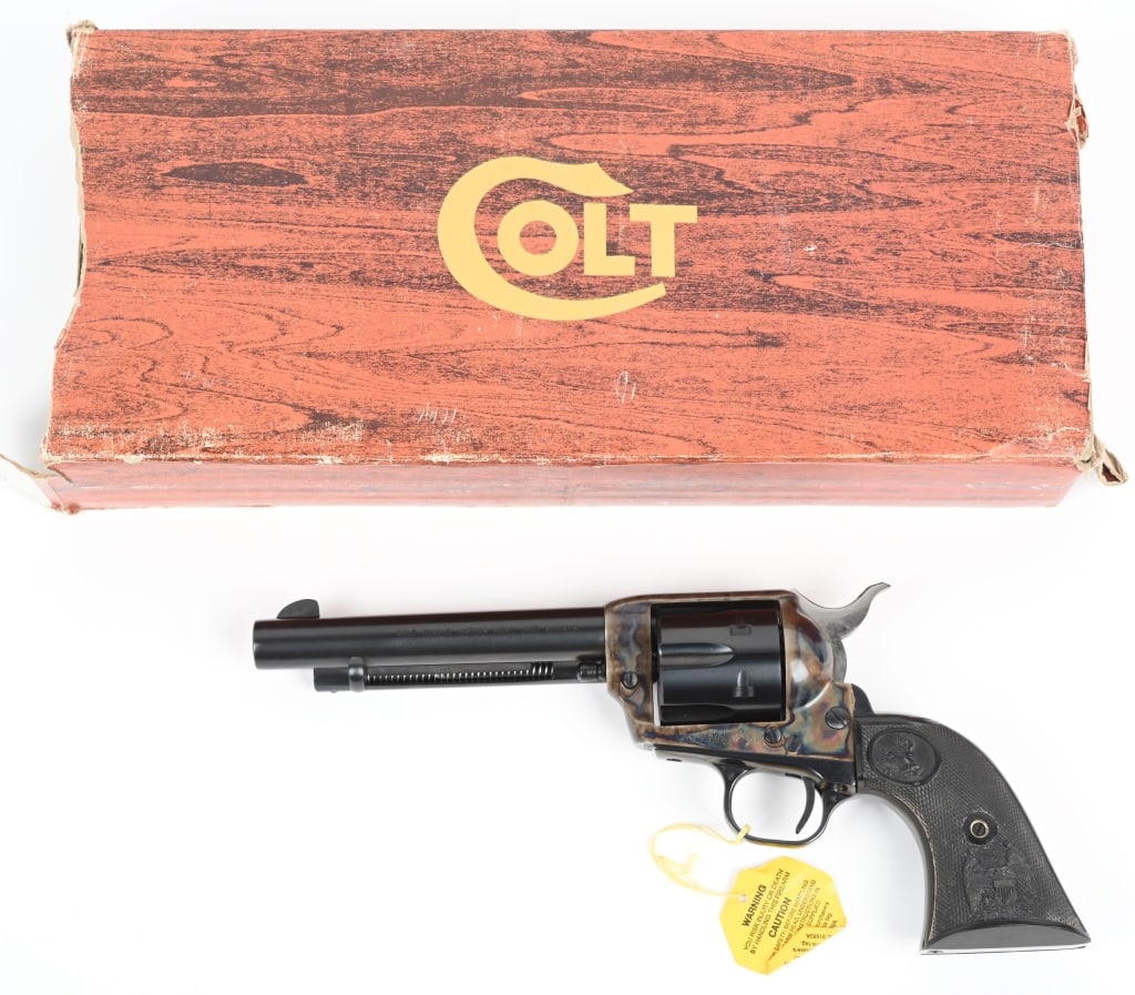 BOXED 3RD GEN. COLT SAA REVOLVER: SERIAL SA20420. BARREL 5.5". CALIBER .357 MAGNUM. MADE IN 1979. Standard blue and case color finish with black eagle grips. Comes in box with hang tag, paper work, etc. End label torn but included. Co