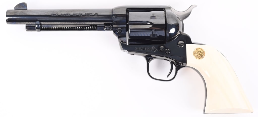 CUSTOM SHOP COLT SINGLE ACTION ARMY 45 W/ IVORY'S: SERIAL NUMBER SA90929 BARREL 5 1/2" CALIBER .45 COLT MANUFACTURED 1990. Colt Custom Shop Single Action Army revolver caliber .45 Colt with high polish Royal Blue finish with Factory Ivory 1-1/2 piece 