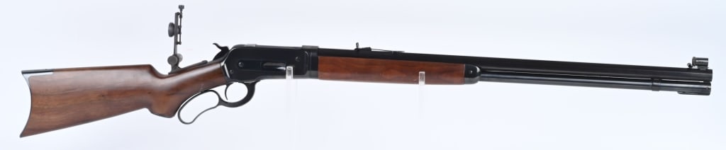 PISTOL GRIP WINCHESTER MODEL 1886 RIFLE-MODERN: SERIAL 01625NP343. BARREL 26". CALIBER 45-70. Features a plain pistol grip walnut stock with grip cap and rifle butt plate. Full octagon barrel & tube, take down, blue finish, globe front sight, sport