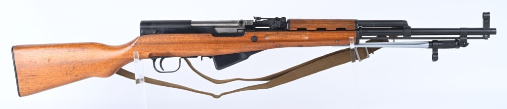 CHINESE NORINCO SKS SEMI AUTO RIFLE: SERIAL NUMBER: 1617584J. BARREL: 20-1/2". CALIBER: 7.62X39. MANUFACTURED: 1980S/90S. Import marked on the receiver. Matching serials throughout. Standard iron sights. This gun has a folding spike bayo