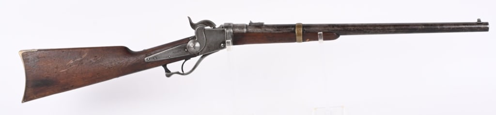 STARR CIVIL WAR PERCUSSION CARBINE: About 20500 made in Yonkers for the US Government in .54 caliber with a 21" barrel. Gun has numerous government inspector stamps, folding leaf military rear sight, brass barrel band, walnut stocks, sa