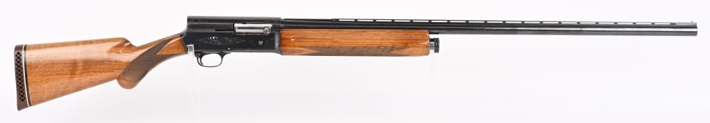 BELGIUM BROWNING A-5 MAGNUM 12 SEMI AUTO SHOTGUN: SERIAL 6V82791. BARREL 31". GAUGE 12 . CHAMBER 3". CHOKE MOD. LOP 14". Features blue finish, engraved frame, vent rib barrel, round knob checkered walnut stocks, Browning recoil pad. Condition. 95% wi